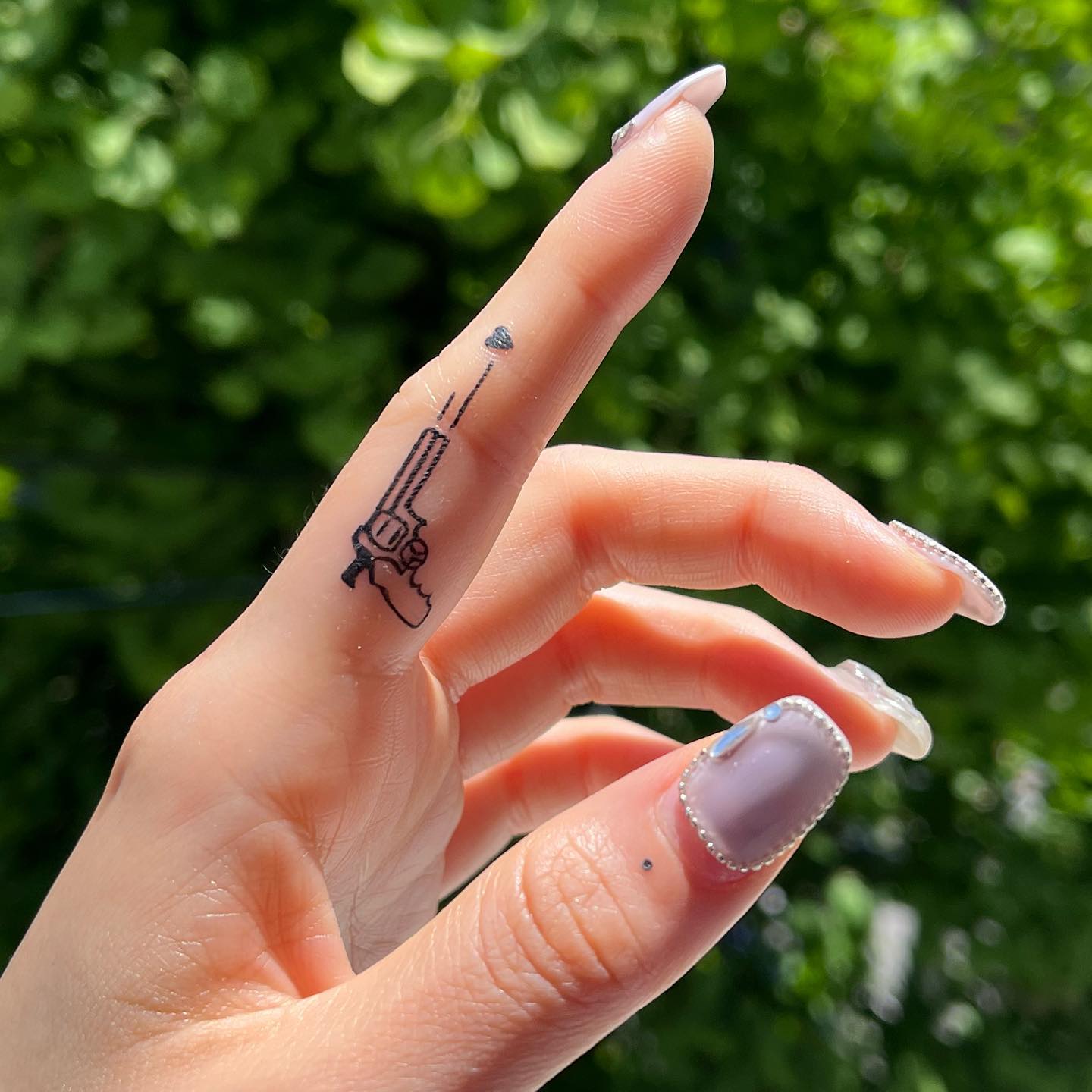 Birdcage on Finger Tattoo Idea