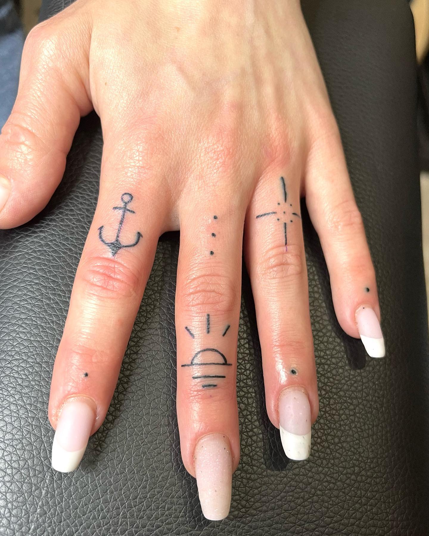 Small Anchor Tattoo on Index Finger