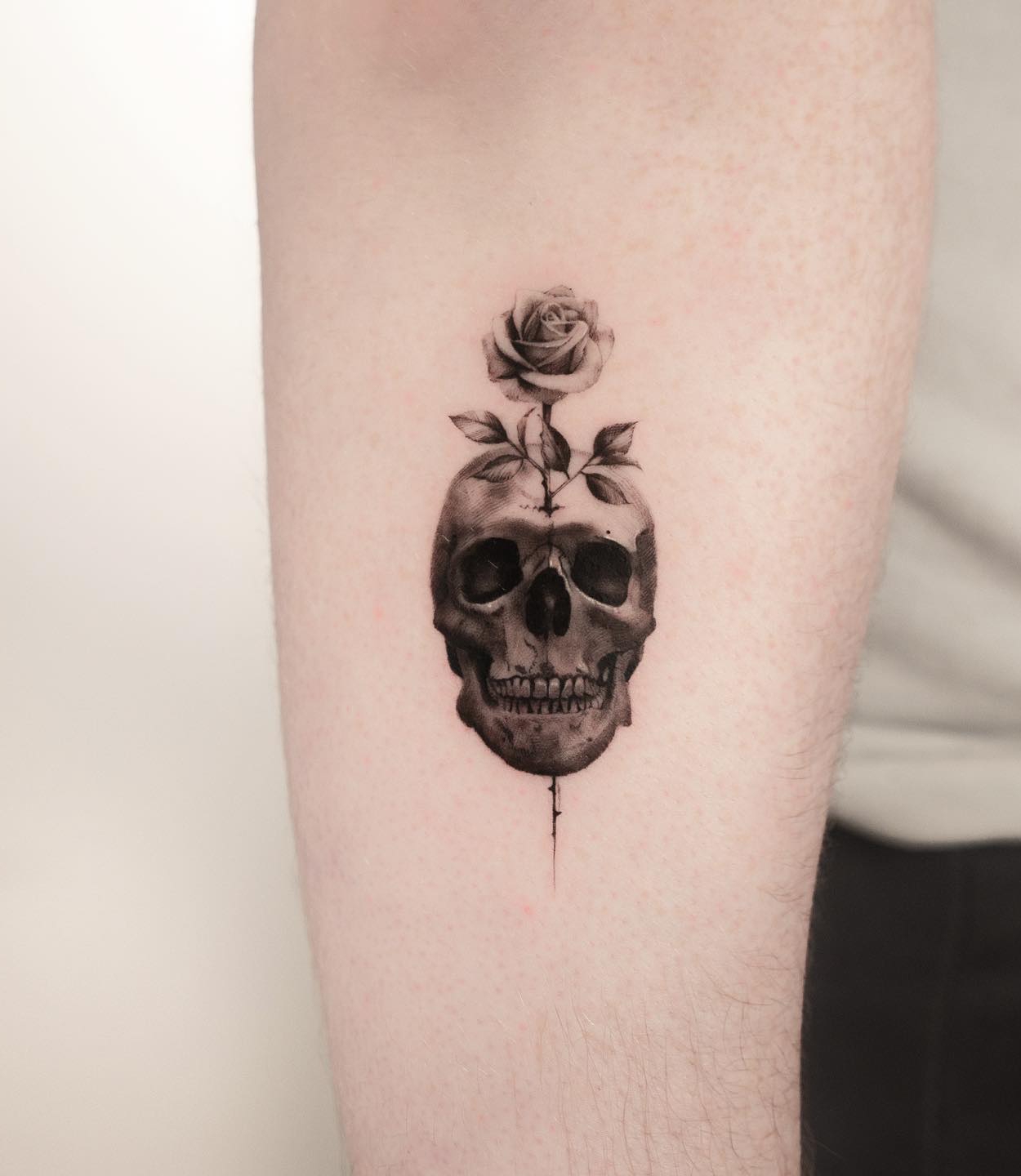 Skull and Rose Tattoo on Arm