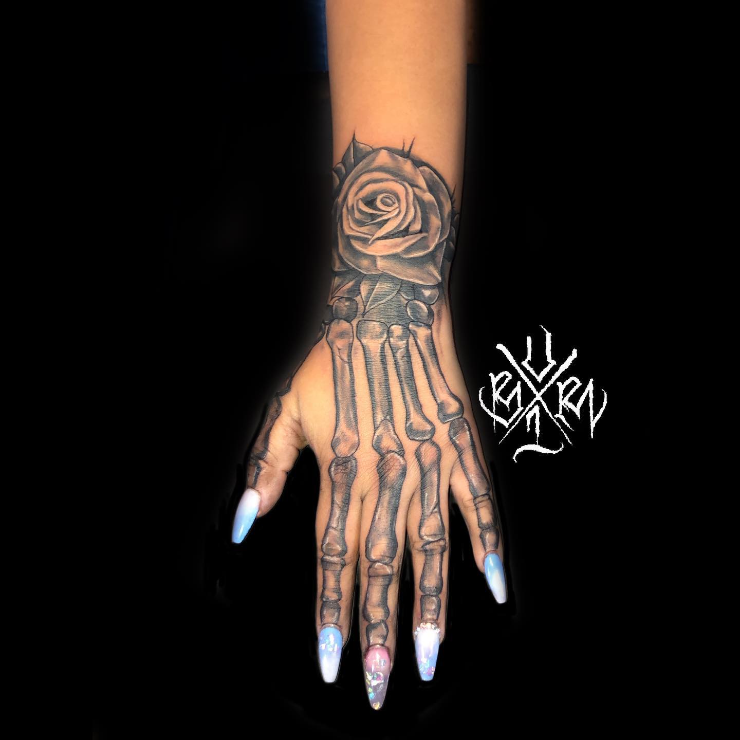 Black Rose Skeleton Hand Tattoo