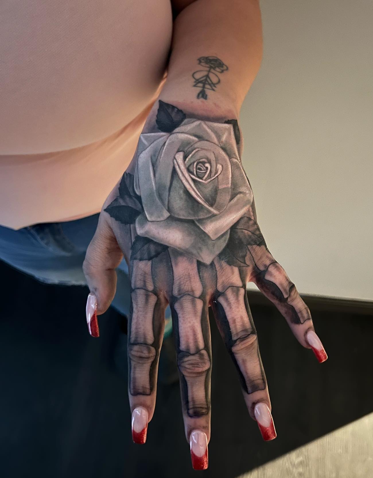 3D Rose and Skeleton Tattoo on Hand