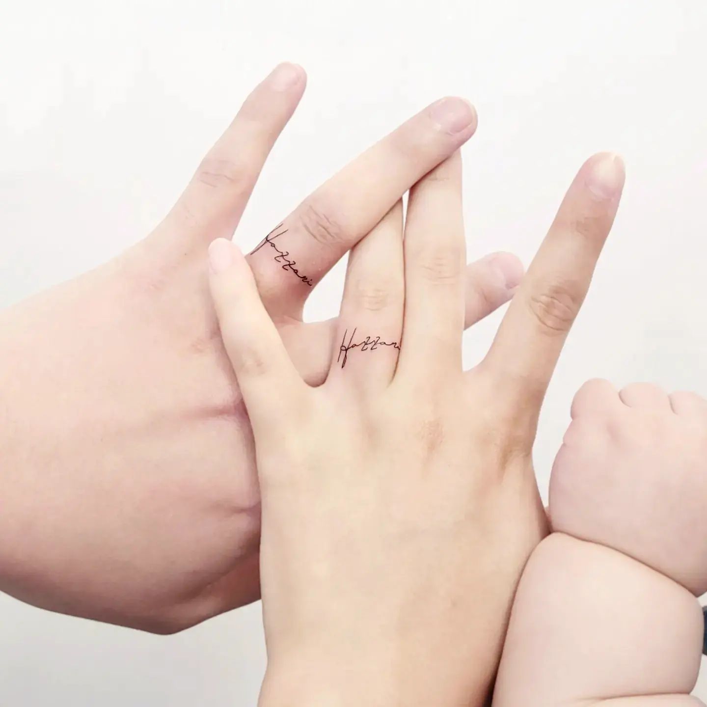 Letter Ring Tattoos on Ring Fingers