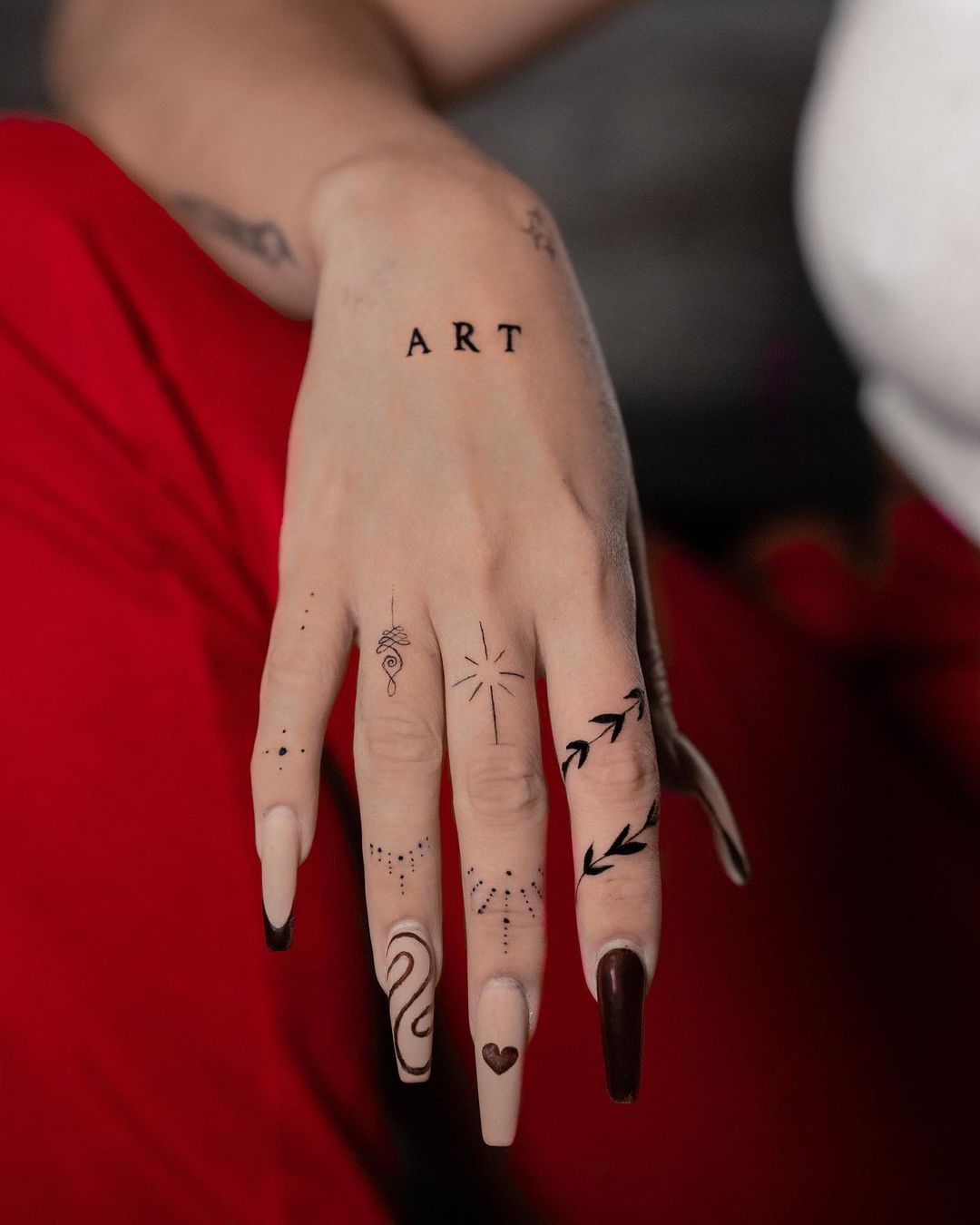 Finger Tattoos 10 Best Finger Tat Ideas  Designs  WHO Magazine