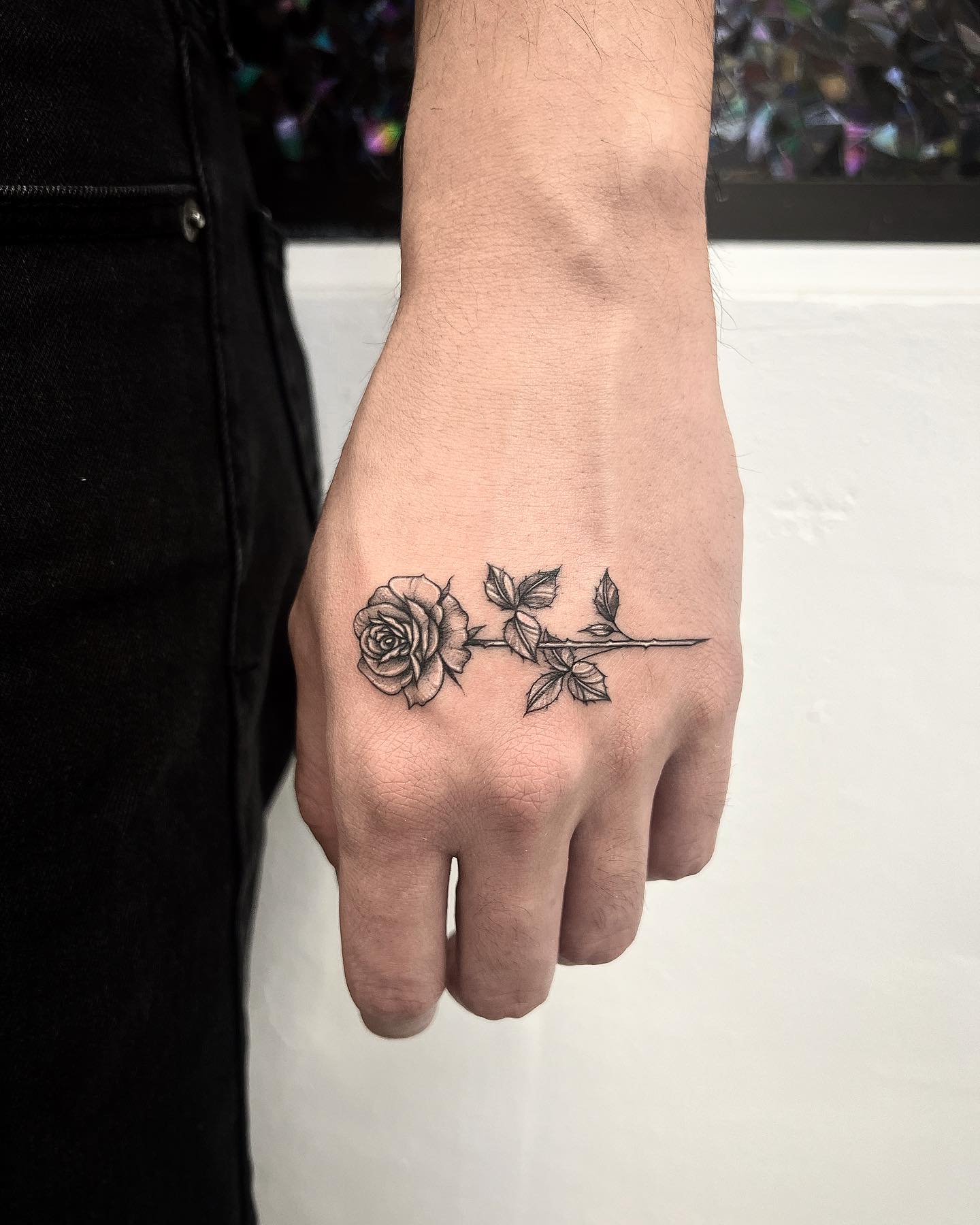 Black Rose Tattoo on Hand