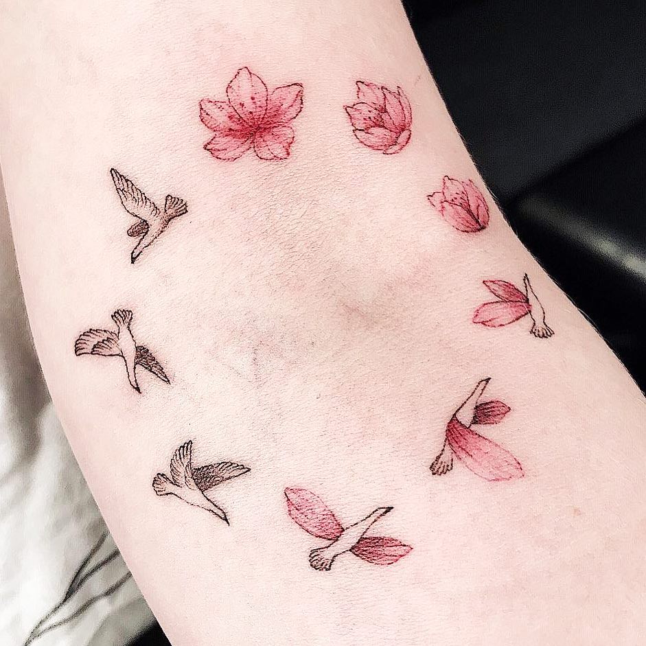 Delicate minimal flowers tattoo  Tattoogridnet