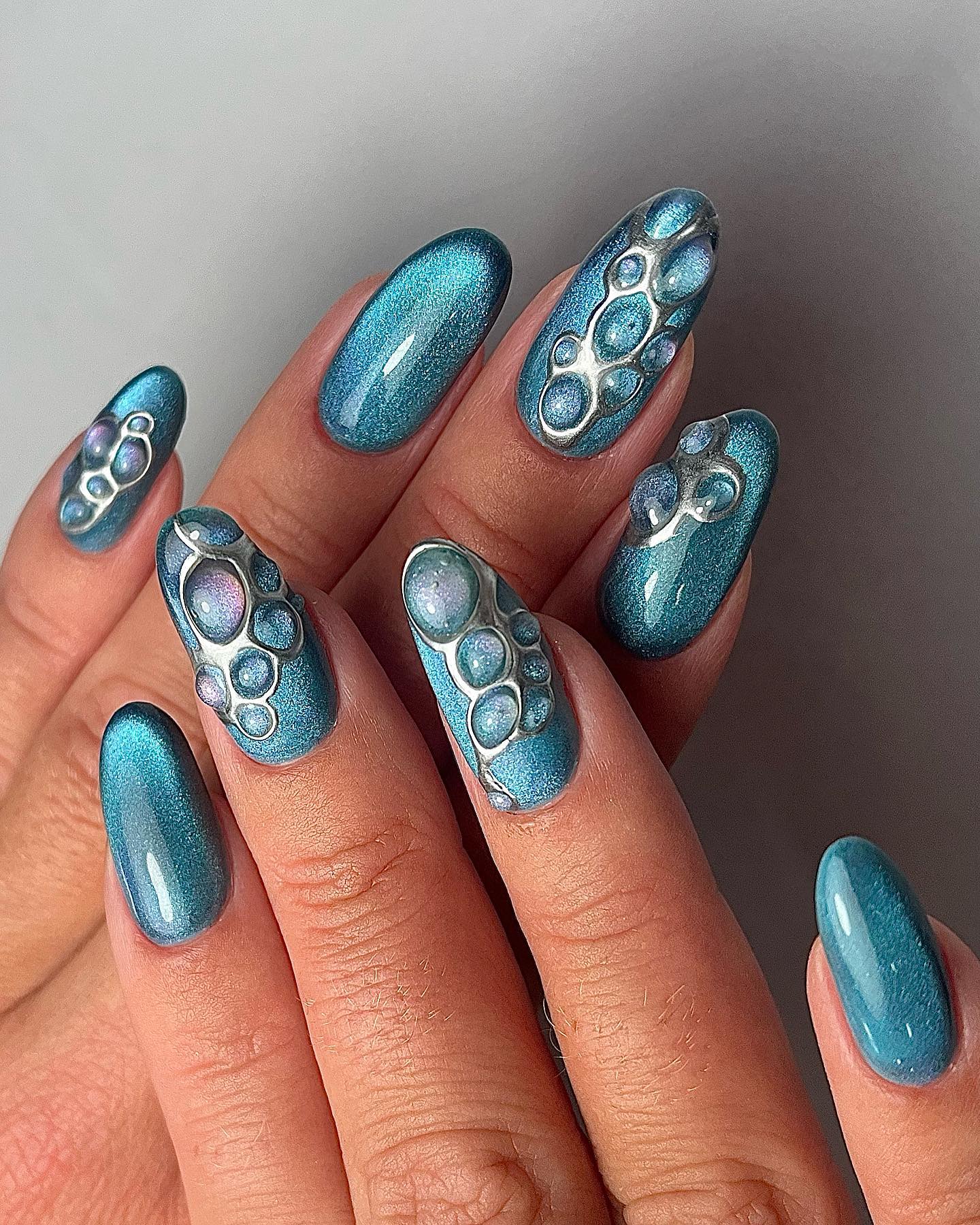 Blue Cat Eye Nails with Bubble Design