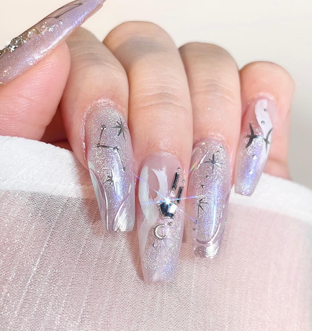 Long Clear Nails with White Cat Eye Effect